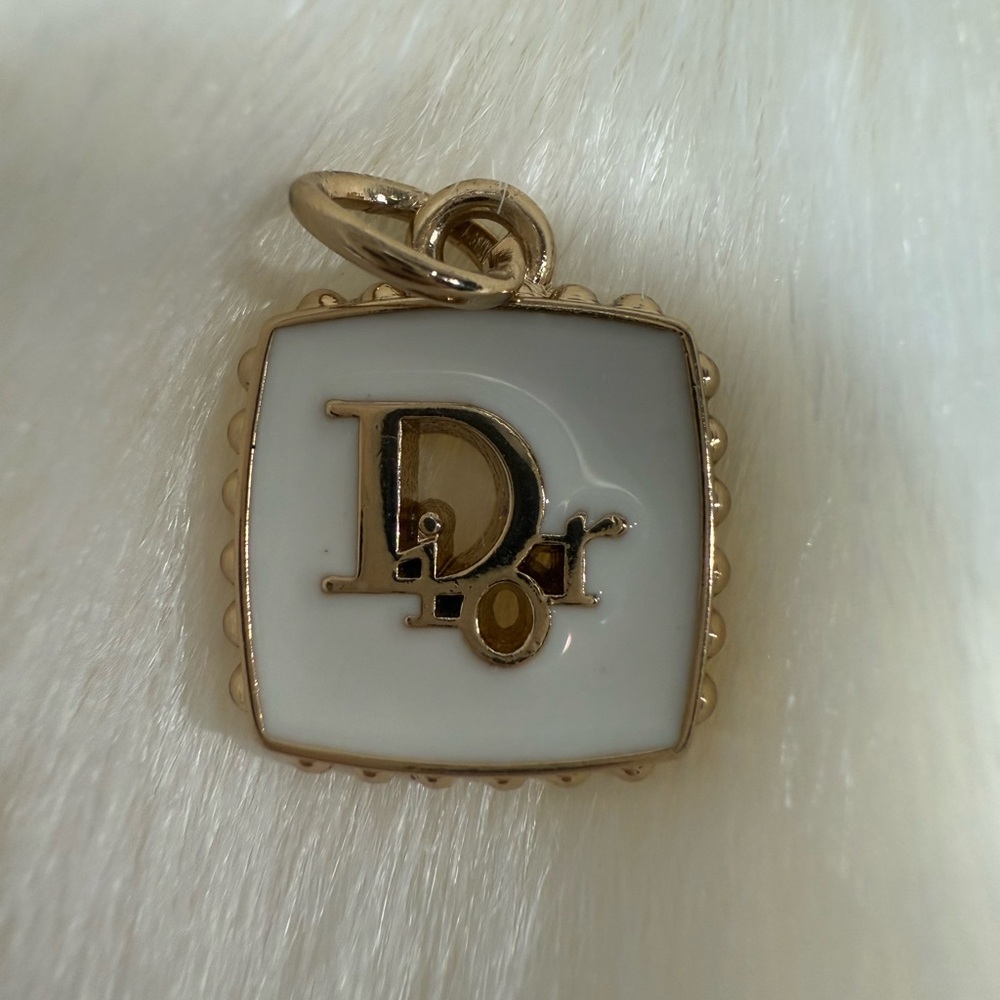 Dior White and Gold Colored Charm